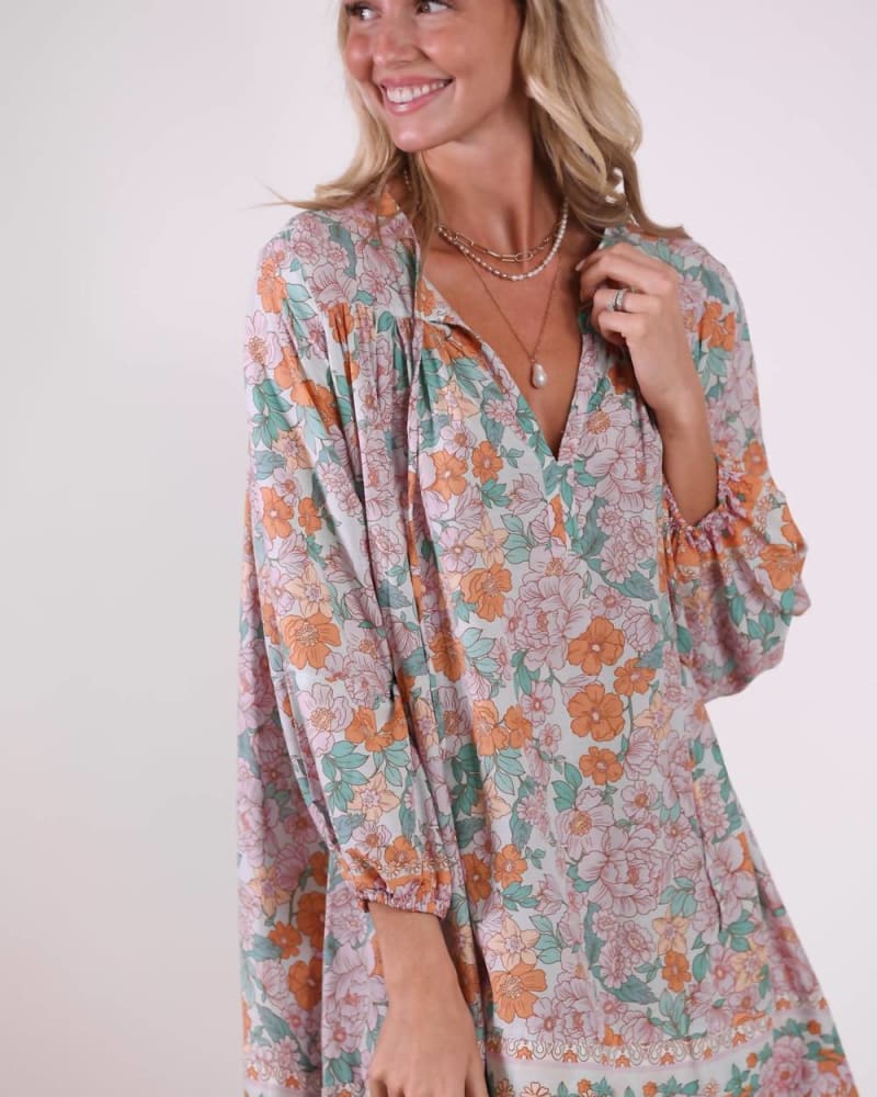Front of a model wearing a size L/XL Paige Tunic In Turquoise in Turquoise by SEALUSTRE. | dia_product_style_image_id:357534